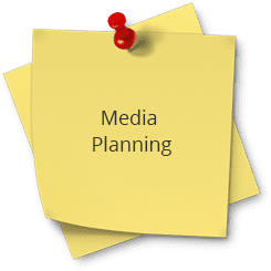 A yellow post it note with the words " media planning ".