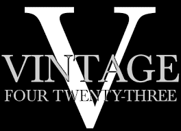 A black and white logo for vintage v.