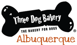 A black and white logo for three dog bakery.